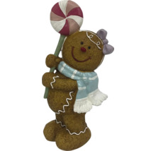 Figurine en pain d''épices avec sucette comme décoration de Noël