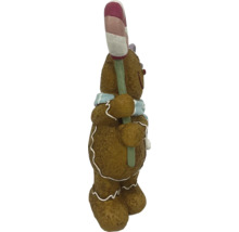 Figurine bonhomme en pain d''épices avec canne en sucre