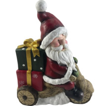 Figurine de Père Noël sur véhicule en bois avec cadeaux