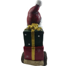 Figurine décorative Père Noël sur cadeaux