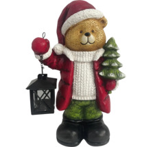 Ours en peluche comme décoration de Noël avec lanterne et sapin de Noël
