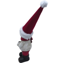 Nain de Noël avec bonnet rouge comme décoration de jardin