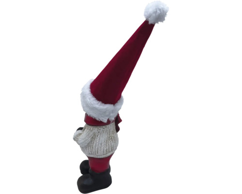 Nain de Noël avec bonnet rouge comme décoration de jardin