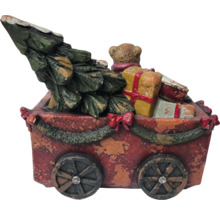 Dekorative Miniatur eines Wagens mit Weihnachtsbaum und Geschenken