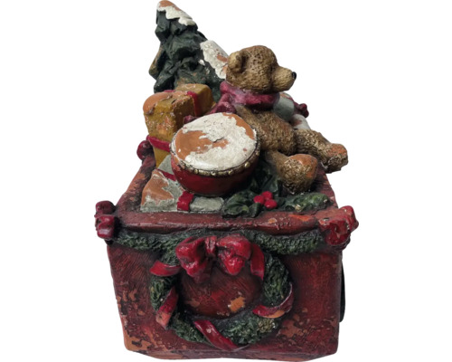 Dekorative Weihnachtsfigur mit Teddybär, Trommel und Weihnachtsbaum in einer Schachtel.