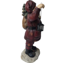 Figurine Père Noël avec lanterne et sapin