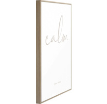 Gerahmtes Bild mit dem Schriftzug Calm, Inhale und Exhale als Wanddekoration