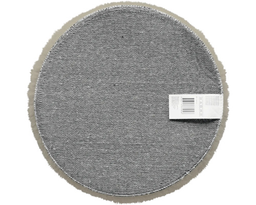 Tapis rond avec étiquette au dos