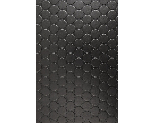 Detailansicht einer Bodenmatte mit Noppenmuster.