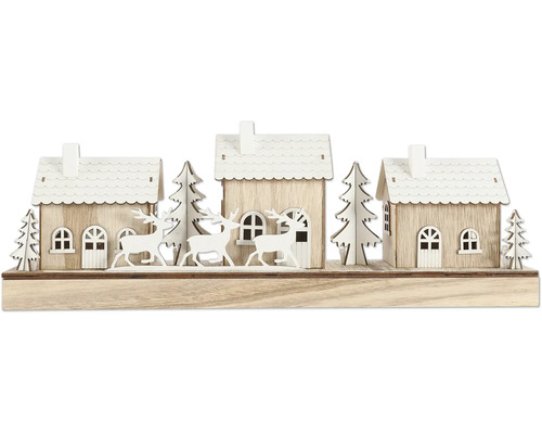 Paysage décoratif en bois avec maisons, arbres et rennes pour la période de Noël