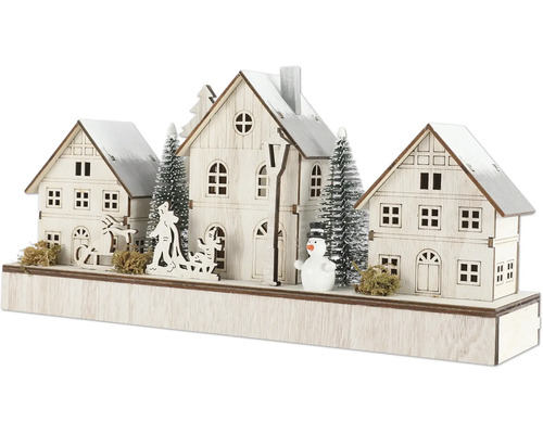 Scène de maison de Noël décorative avec maisons, arbres, bonhomme de neige, cheval et traîneau