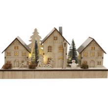 Décoration en bois illuminée avec maisons, sapins et bonhomme de neige pour la période de Noël
