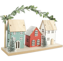 Dekoration mit drei Häusern, Bäumen und Blättergirlande