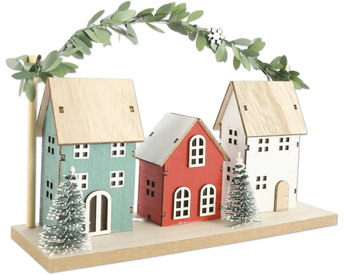 Dekoration mit drei Häusern, Bäumen und Blättergirlande