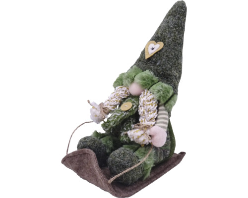 Figurine décorative lutin sur luge avec application coeur sur le bonnet