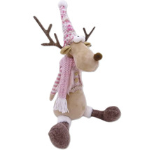Renne décoratif avec bonnet et écharpe comme décoration de Noël
