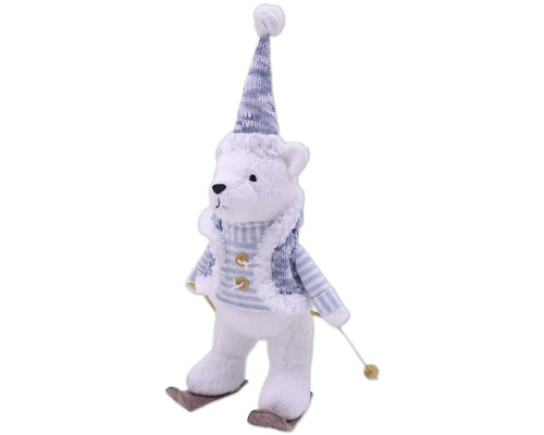 Ours en peluche décoratif avec bonnet et skis comme décoration de Noël