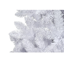Gros plan sur un sapin de Noël artificiel blanc.