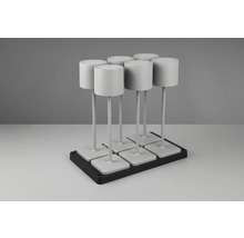 Six lampes blanches sur une base noire.