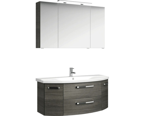 Badezimmermöbel-Set bestehend aus Waschtisch mit weißem Becken, Unterschrank in dunkler Holzoptik und einem dreitürigen Spiegelschrank mit Beleuchtung.