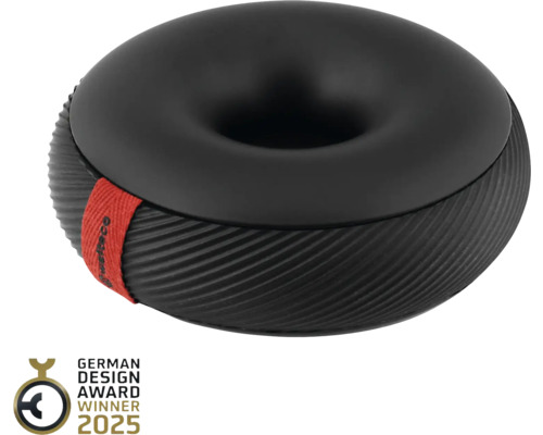 Schwarzer Hocker in Donutform mit rotem Textilband
