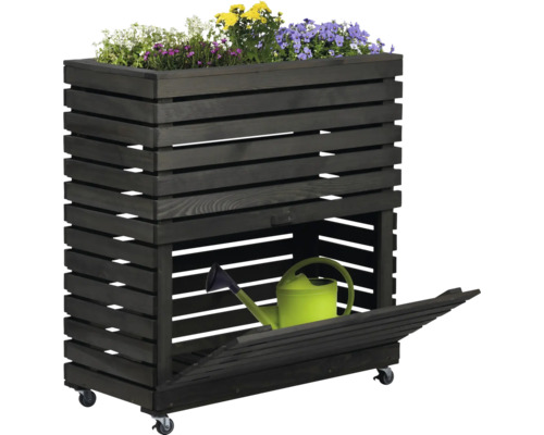 Jardinière surélevée avec espace de rangement en bois et plantée de fleurs