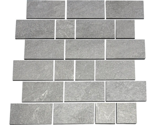 Disposition de carreaux en céramique gris de différentes tailles