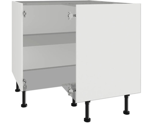 Meuble bas avec porte ouverte et étagères