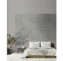 Schlafzimmer mit Akustikpaneelen an der Wand hinter dem Bett