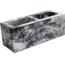 Grauer Betonblock mit zwei Hohlräumen