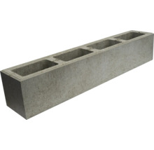 Bloc de béton gris avec cavités