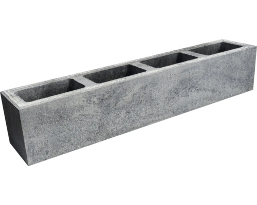 Grauer Schalungsstein mit Hohlräumen