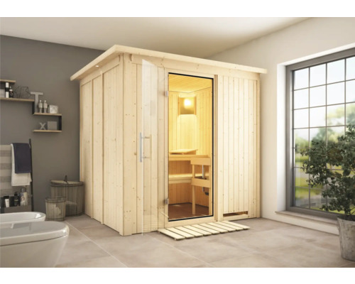 Sauna en bois avec porte en verre dans une salle de bain