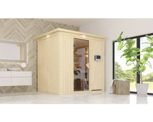 Sauna modulaire Karibu Bodina avec poêle 9 kW et commande externe avec couronne et portes entièrement vitrées coloris bronze Scène de salle de bains moderne avec un sauna en bois, un lavabo et un miroir
