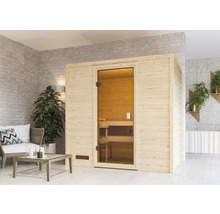 Sauna en bois avec porte en verre dans une pièce lumineuse