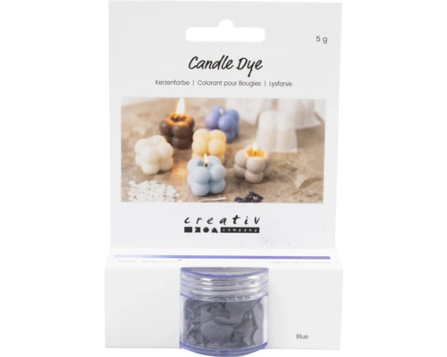 Colorant pour bougies dans un emballage avec un récipient contenant des pigments de couleur