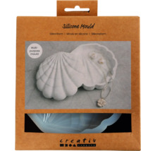 Silikonform in einer braunen Verpackung mit einer weißen Muschelform