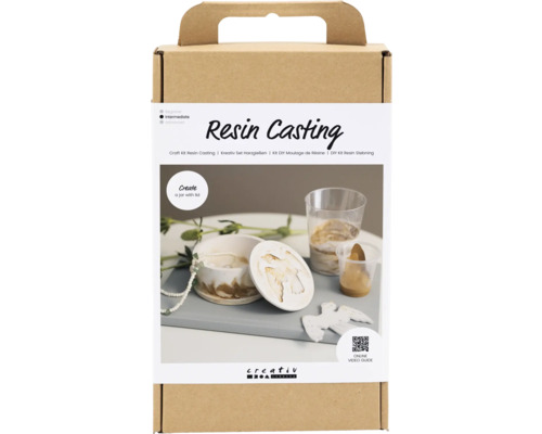 Kit créatif de moulage de résine dans un emballage en carton brun.