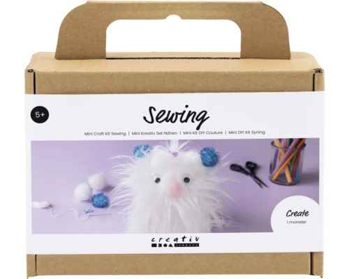 Näh-Set für ein Monster zum Selbermachen in einer braunen Pappschachtel