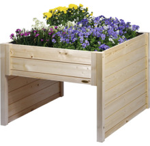 Hochbeet aus Holz mit bunten Blumen bepflanzt