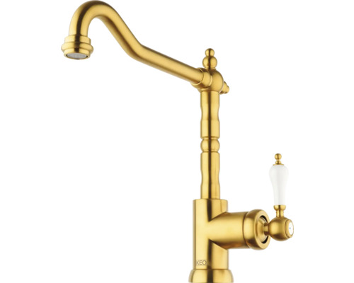 Goldfarbene Küchenarmatur mit Porzellangriff