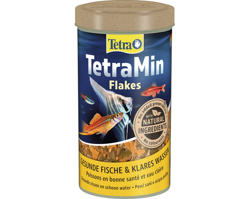 Tetra Min 500 ml Tetra Logo auf einer Dose TetraMin Flocken Fischfutter mit natürlichen Inhaltsstoffen, ohne Konservierungsstoffe, für gesunde Fische und klares Wasser.