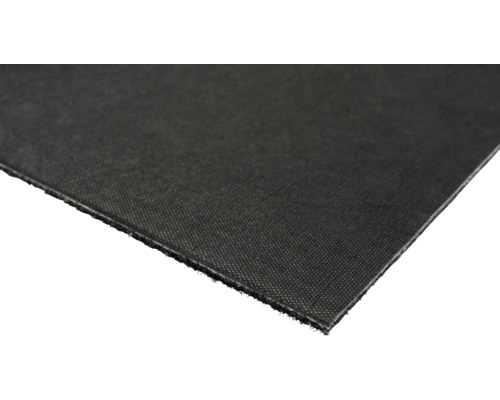 Gros plan d'un tapis de chantier noir.