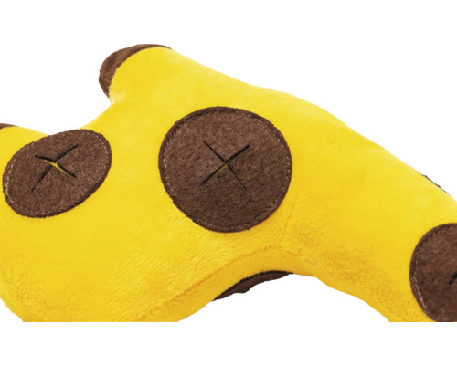 Nahaufnahme eines gelben Giraffenkopf-Plüschtiers mit braunen Flecken