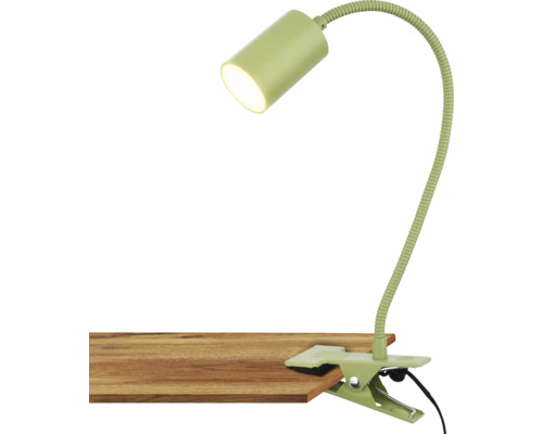 Klemmleuchte mit flexiblem Arm auf einem Tisch