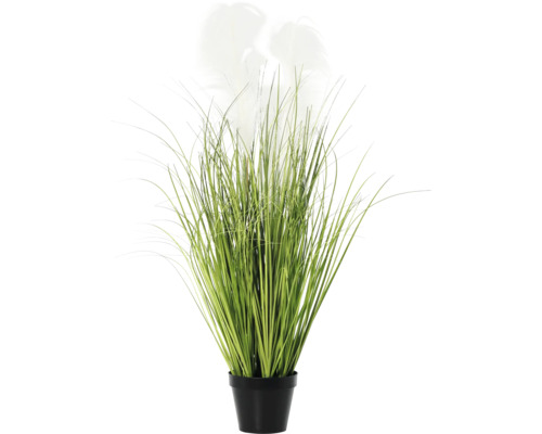 Herbe artificielle dans un pot noir