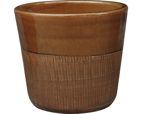 Pot de fleurs en céramique brune avec texture rainurée