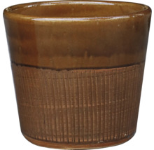 Pot de fleurs en céramique avec texture rainurée