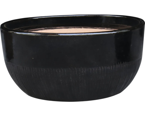 Pot de fleurs noir avec une surface rainurée.