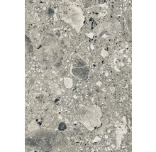 Gros plan d'un carreau de sol avec motif terrazzo